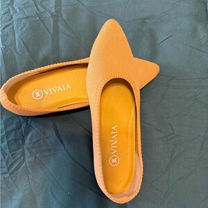 Vivaia pointed toe yellow flats